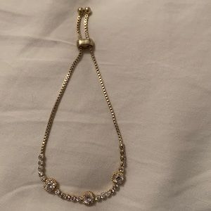 Gold colored bolo bracelet